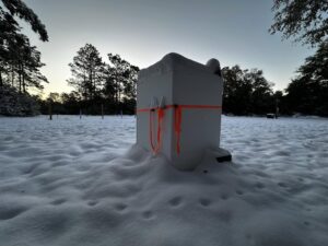 Extra large Styrofoam Cooler by LoBoy protects outdoor equipment in heavy winter snow