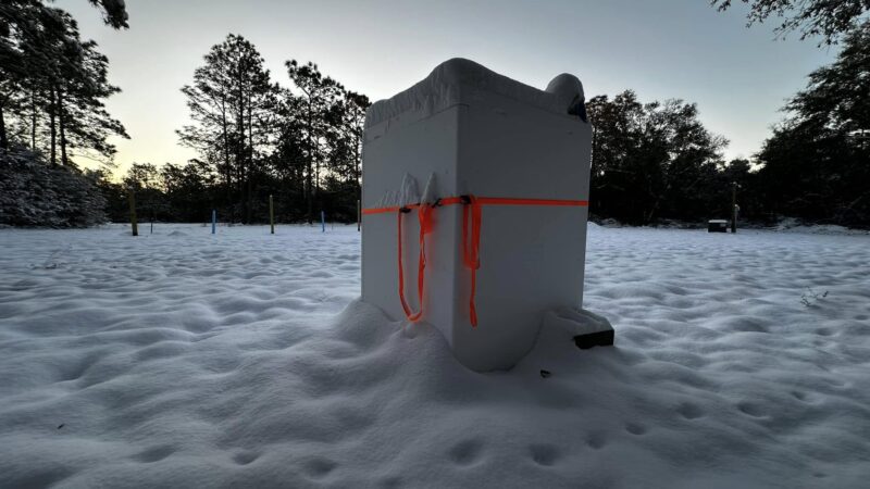 Extra large Styrofoam Cooler by LoBoy protects outdoor equipment in heavy winter snow